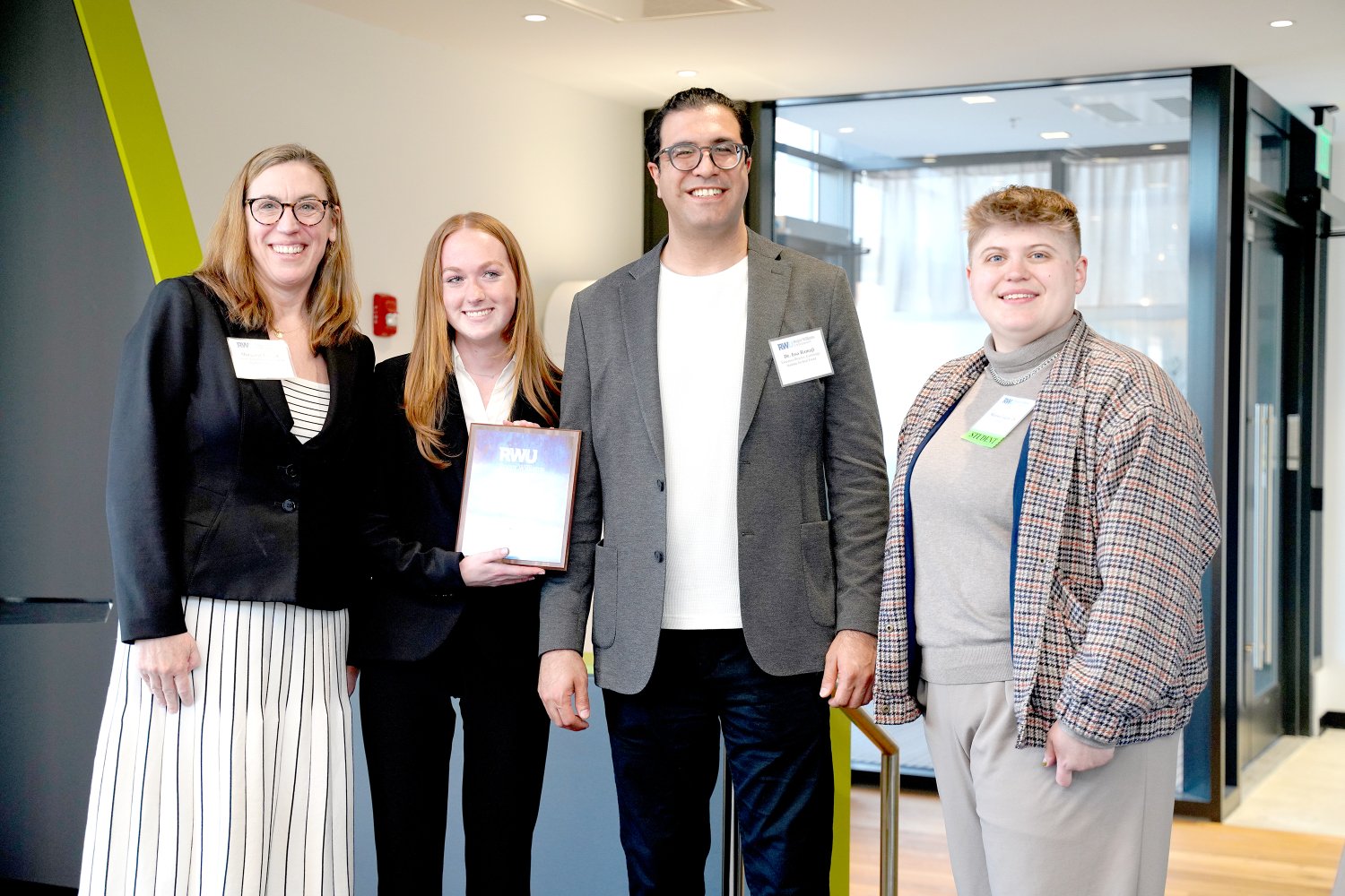 Margaret Everett and Issa Ramaji pose with the second place student team.