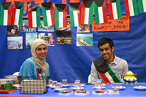 Students sharing their traditional clothing and food