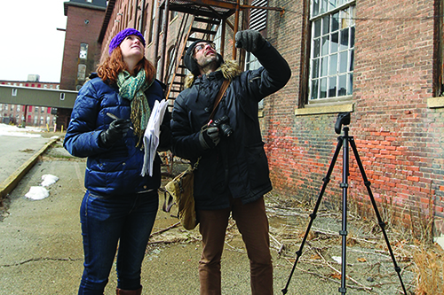 Students surveying in city
