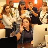 Image of Emily with students