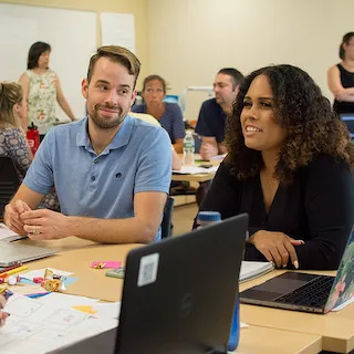 Two EXT students in class