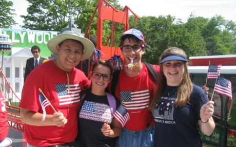 A group of students pose on the float they built.