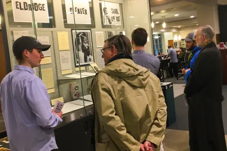 Students provide guided tour of exhibition they curated.