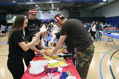 Students compete in cake decorating contest.