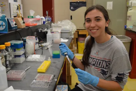 Student conducts research in science ab