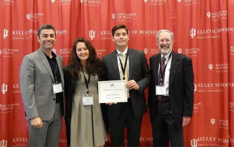 Students pose with award.