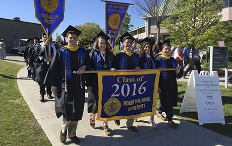 Graduates process to commencement exercises.