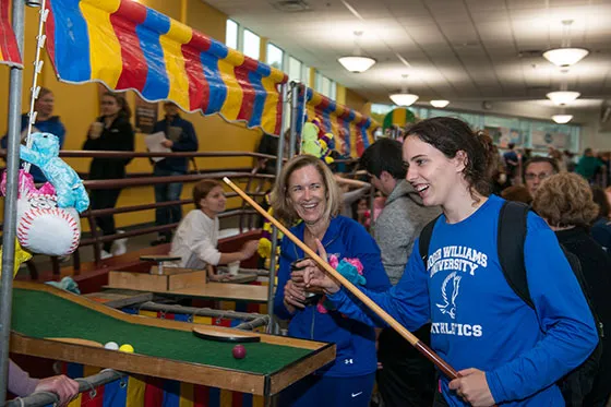 Student and family member at an event.