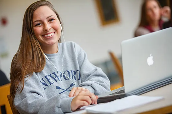 A headshot of a student smiling.