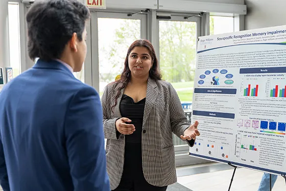Student presenting research