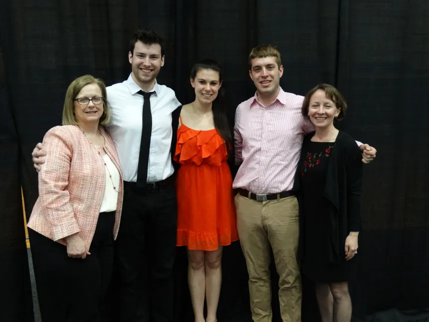 From left: 2015 Henderson Outstanding Tutor Award recipients Benjamin Kennedy in writing, Torrie Lewine in math, and Scott Scarneo in science. They are congratulated by Coordinator of Writing Center Karen Bilotti (left) and Coordinator of Science Center Tracey McDonnell Wysor (right).