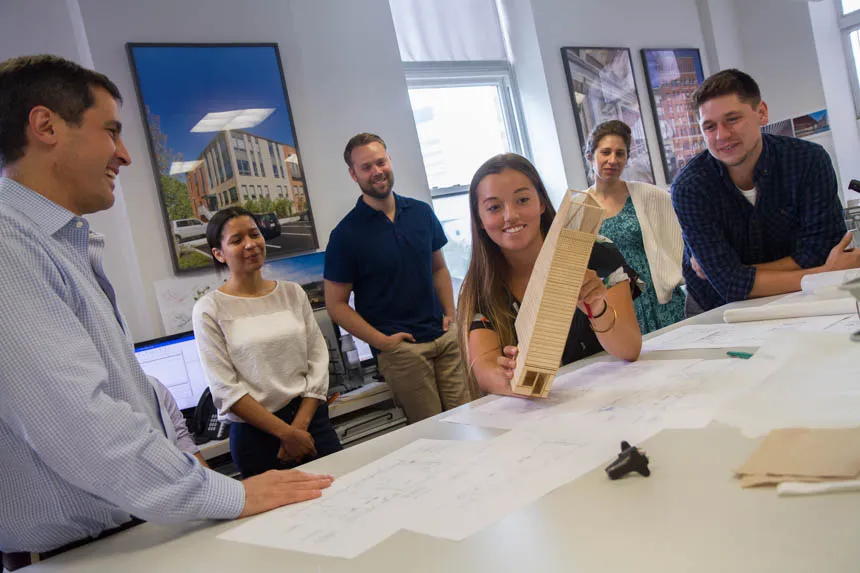Gabby P. Meeting with team at firm