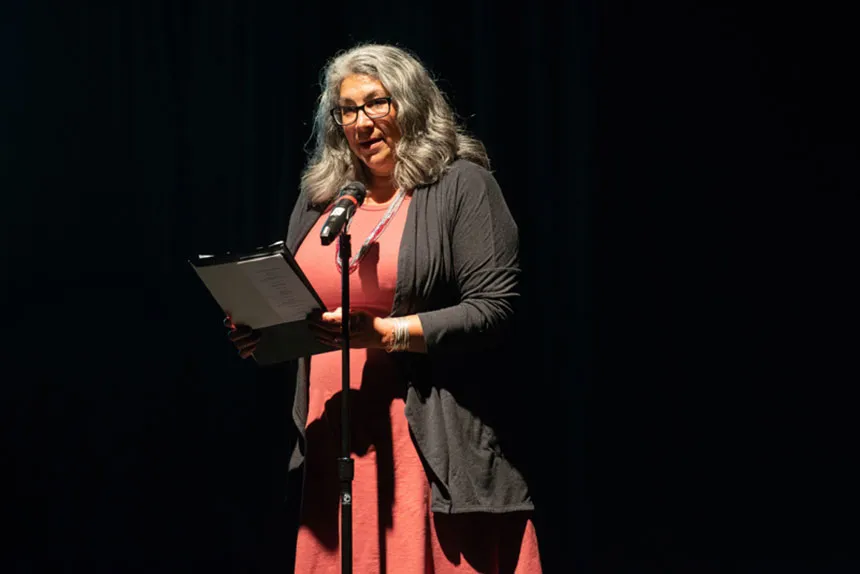 Professor reads a poem.