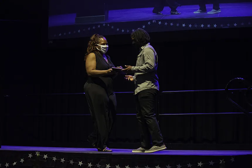 Student receives an award 